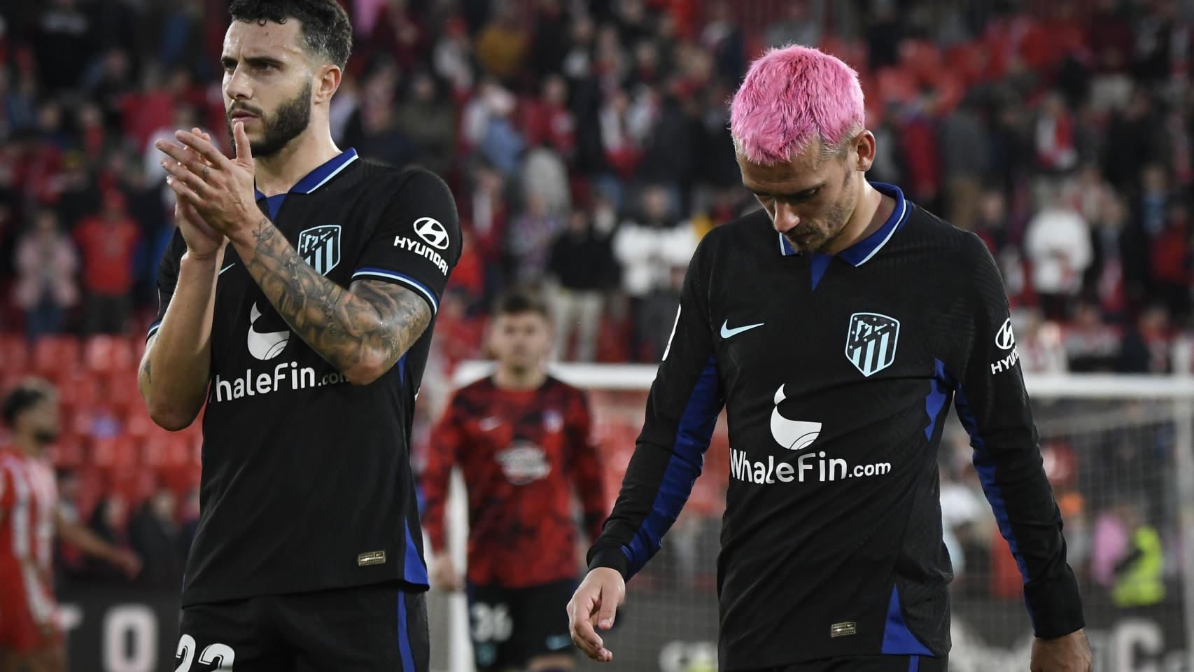 Mario Hermoso y Griezmann, tras el empate ante el Almería.