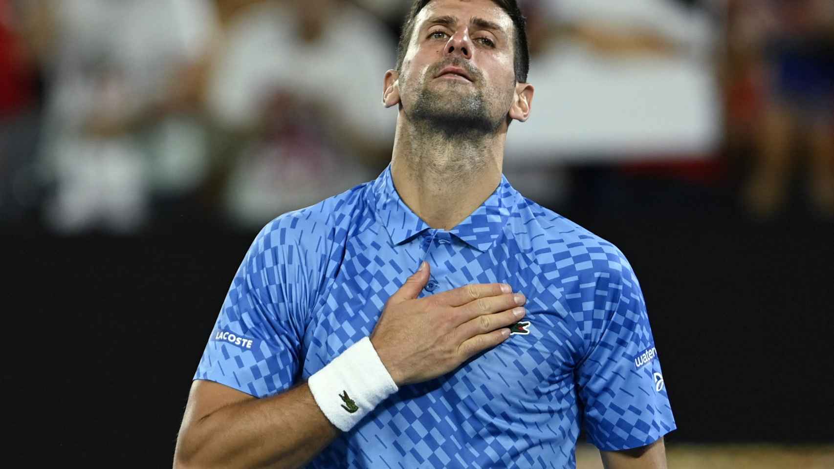Djokovic, golpeándose el pecho tras una victoria en el Open de Australia 2023