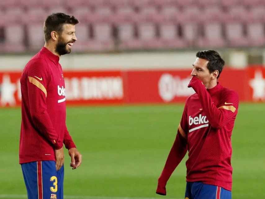 Piqué y Messi, entrenando con el Barça