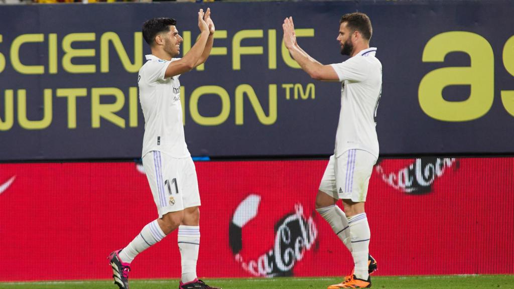 Marco Asensio y Nacho Fernández, celebrando un gol del Real Madrid en La Liga 2022/2023