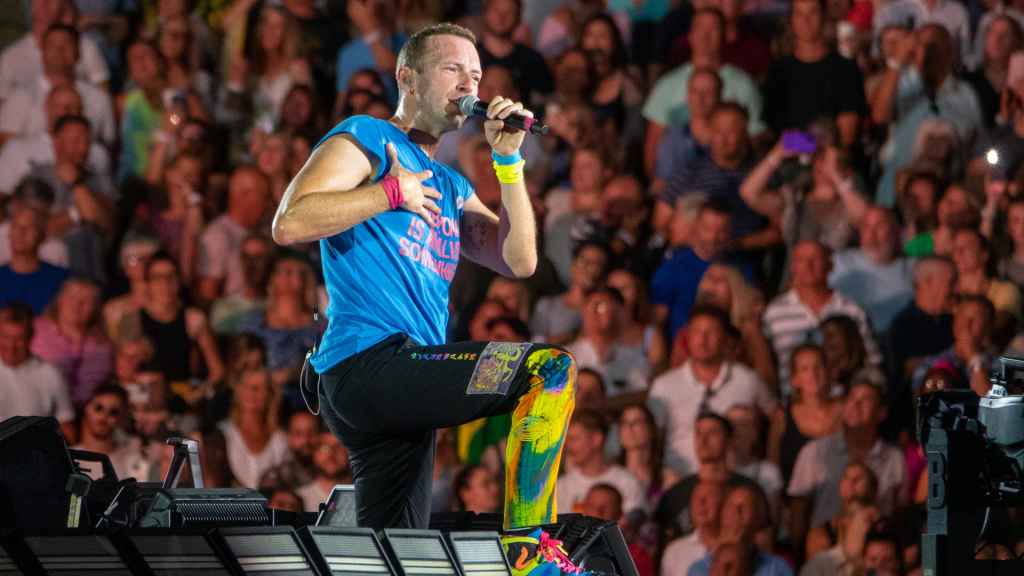 La banda de rock británica Coldplay, tocando en el estadio de Wembley el 12 de agosto de 2022.
