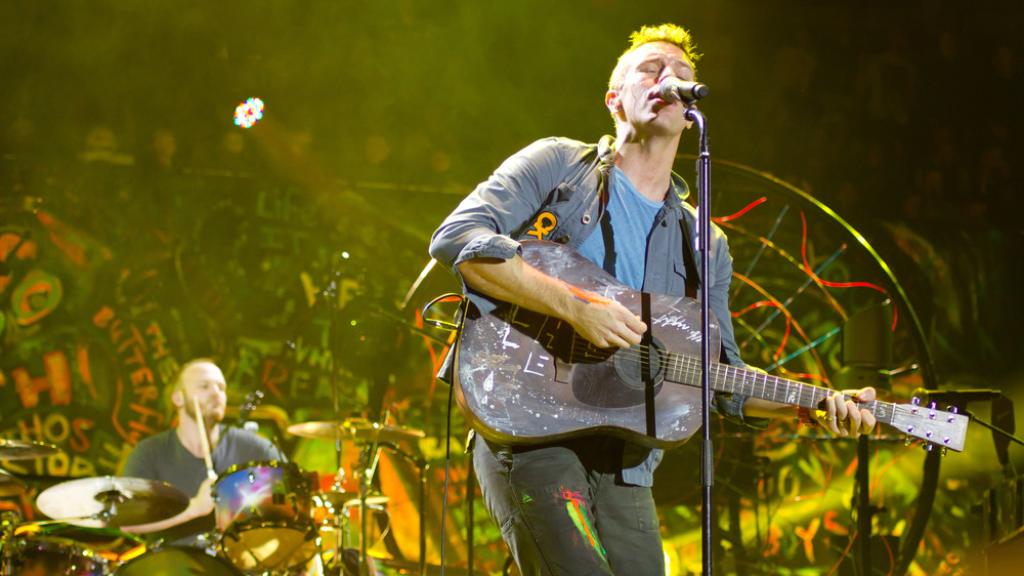 La banda británica Coldplay actuando en directo. Shutterstock