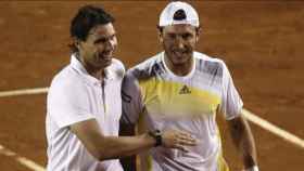 Rafa Nadal y Juan Mónaco, en un partido de dobles