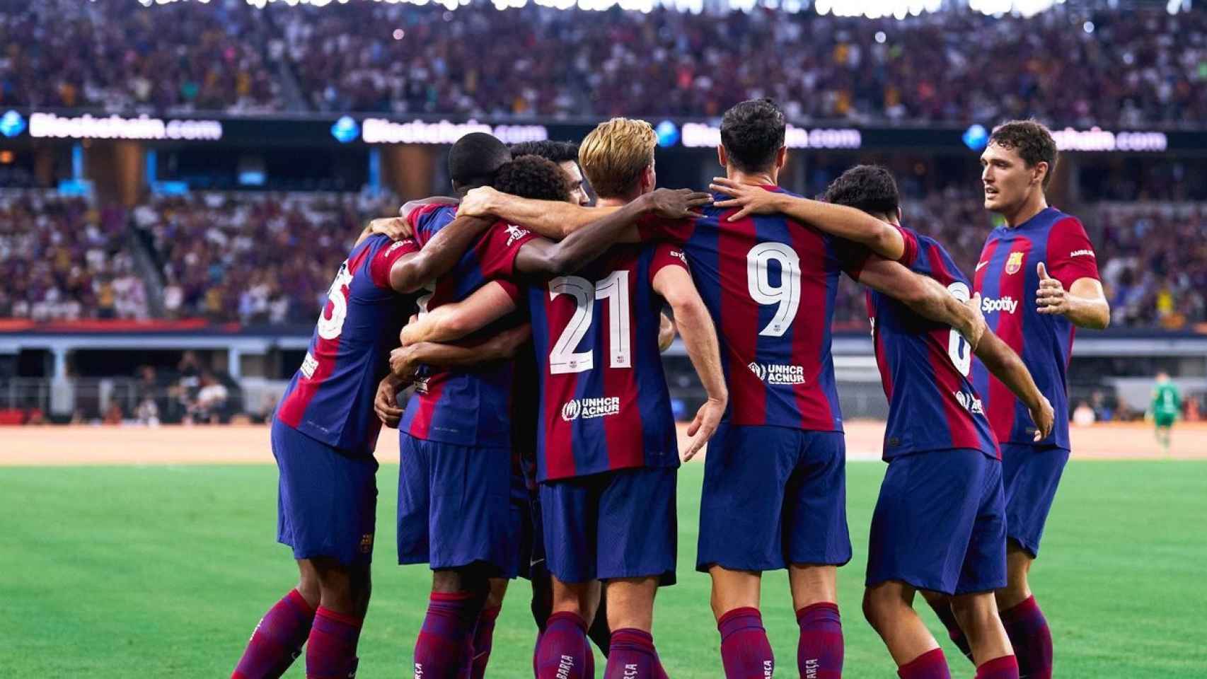 Los jugadores del FC Barcelona celebran un gol durante un partido de la pretemporada