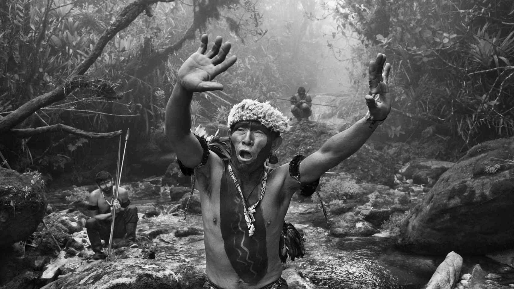 Sebastião Salgado: 'Yanomami shaman interacts with spirits before an ascent to Pico da Neblina'. Estado del Amazonas, Brasil, 2014