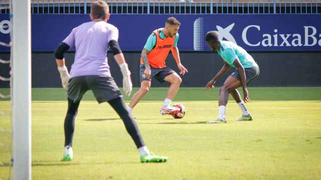 Dioni y Moussa durante en entrenamiento con el Málaga CF