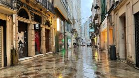 La Calle Real de A Coruña durante una jornada lluviosa.
