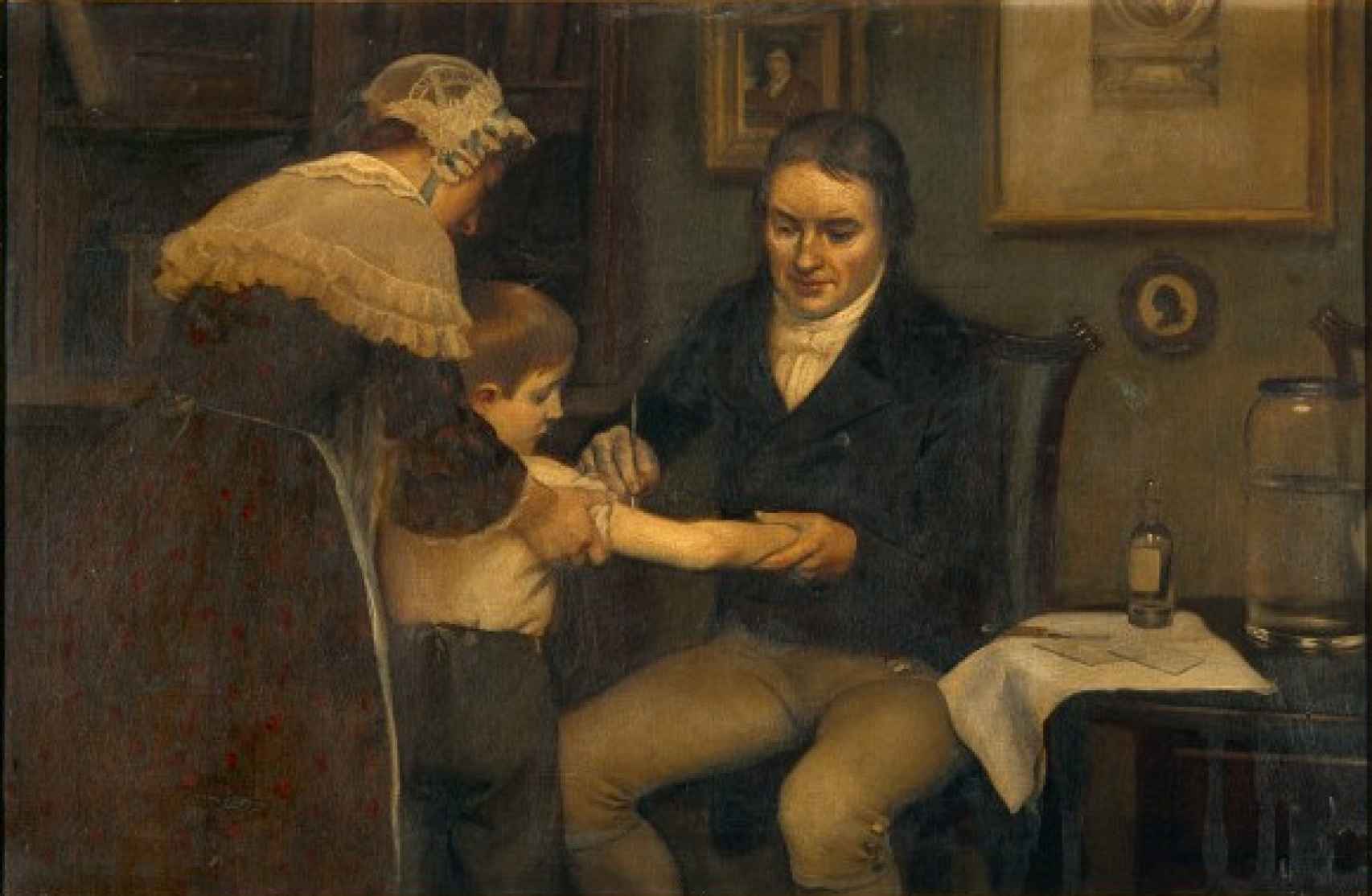 El doctor Jenner realizando la primera vacunación de la historia en 1796