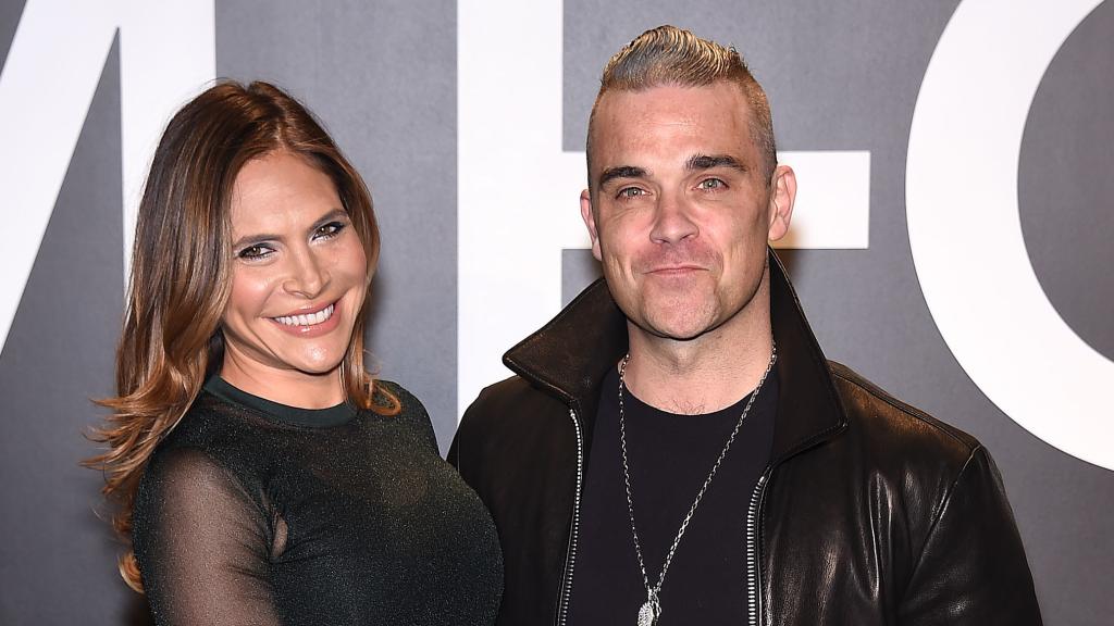 Robbie Williams y Ayda Field.