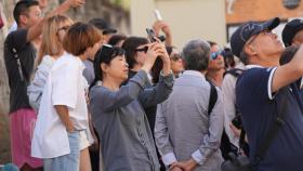 Un grupo de turistas asiáticos en la ciudad de Sevilla