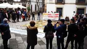 Acto de Os Ningúens en la Plaza de la Constitución en recuerdo a las 16 personas fallecidas en Vigo sin hogar y en situación de pobreza extrema.
