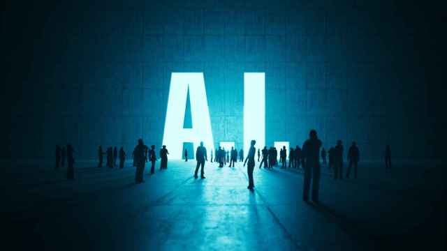 Humanos ante la siglas de la inteligencia artificial