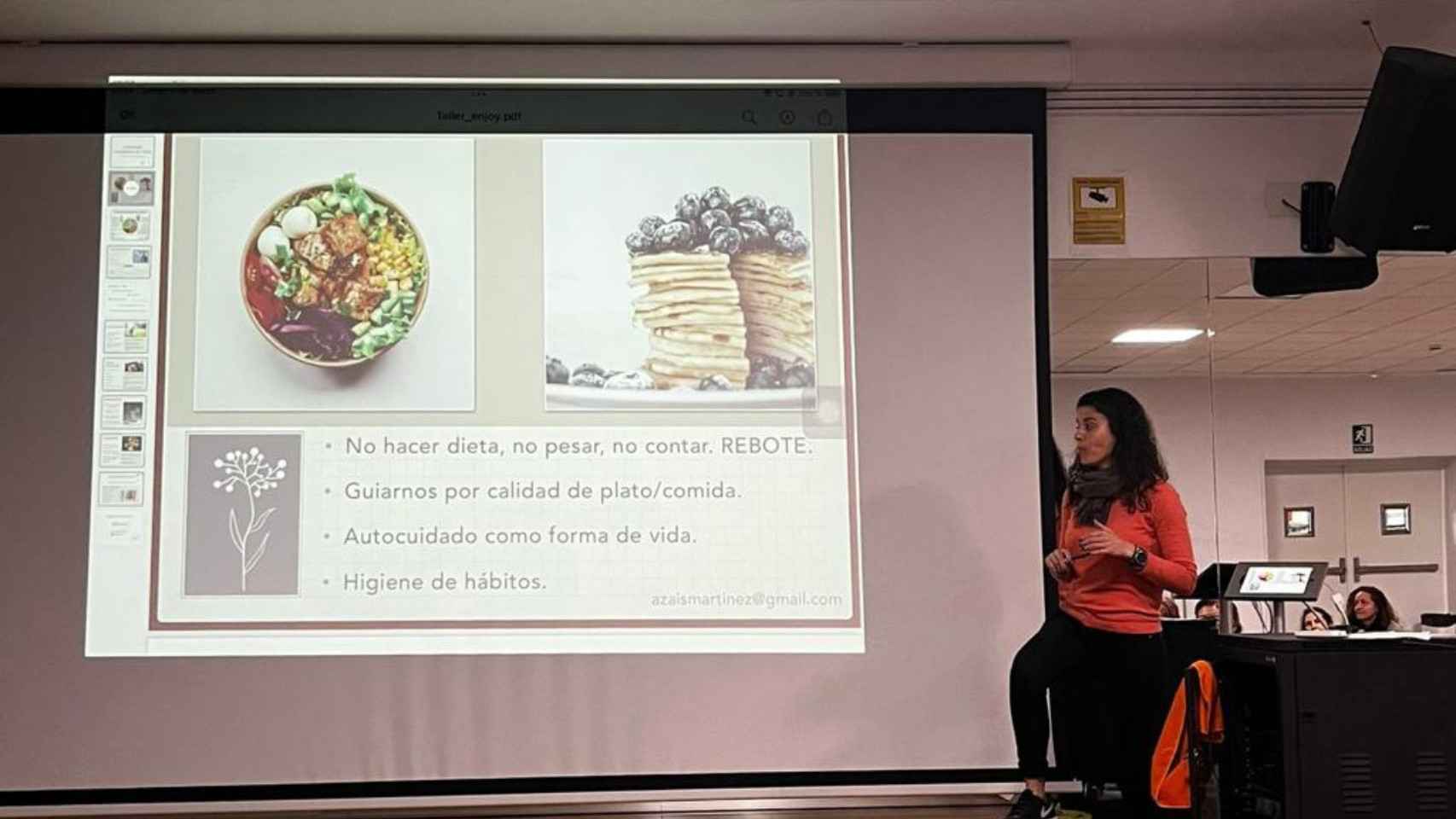Azais Martínez impartiendo una charla sobre nutrición.