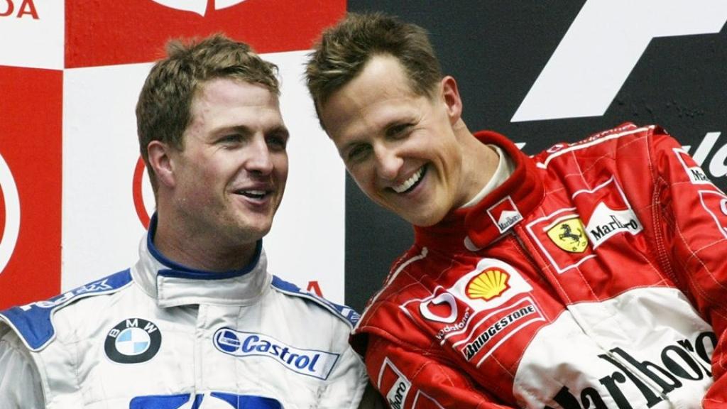 Ralf y Michael Schumacher posan juntos en el GP de Canadá en 2003.