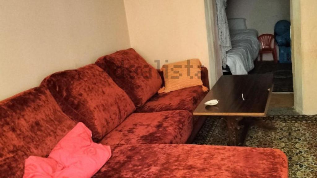 El salón de la vivienda a la venta en Villacid de Campos.