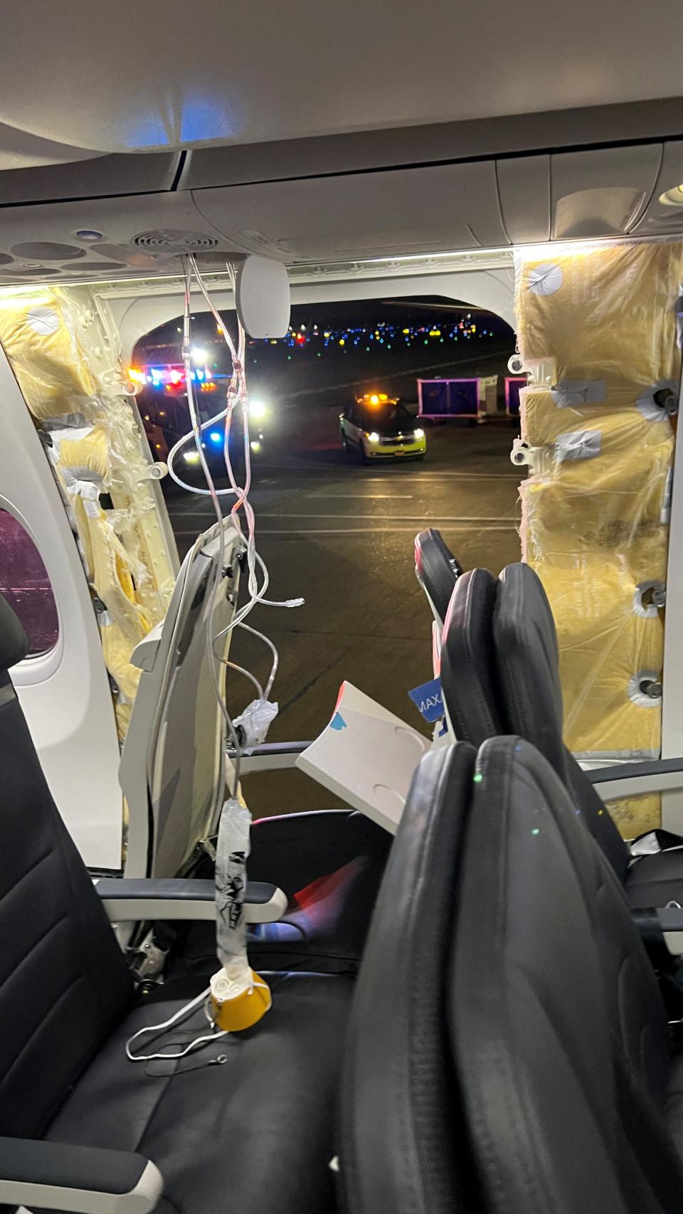 Hueco dejado por la puerta de emergencia tras desprenderse en pleno vuelo