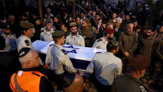 Funeral de una mujer israelí y su hijo, asesinados por terroristas de Hezbolá.