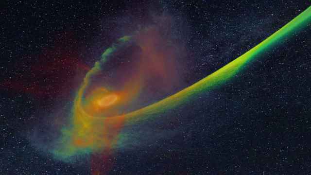 Recreación del fenómeno por el que un agujero negro engulle una estrella.
