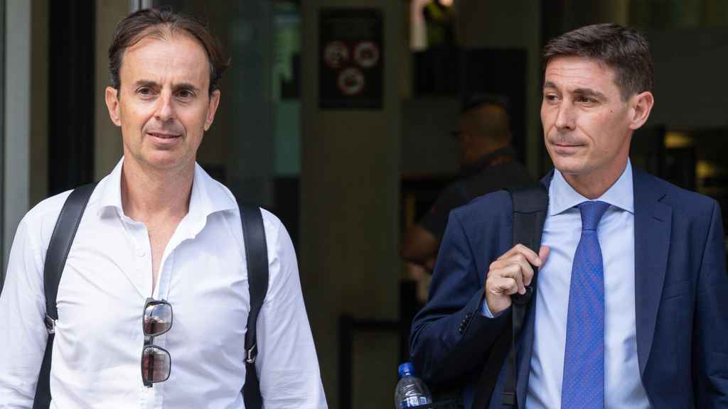 Josep Santacana y Juan Segarra a la salida de un juicio.