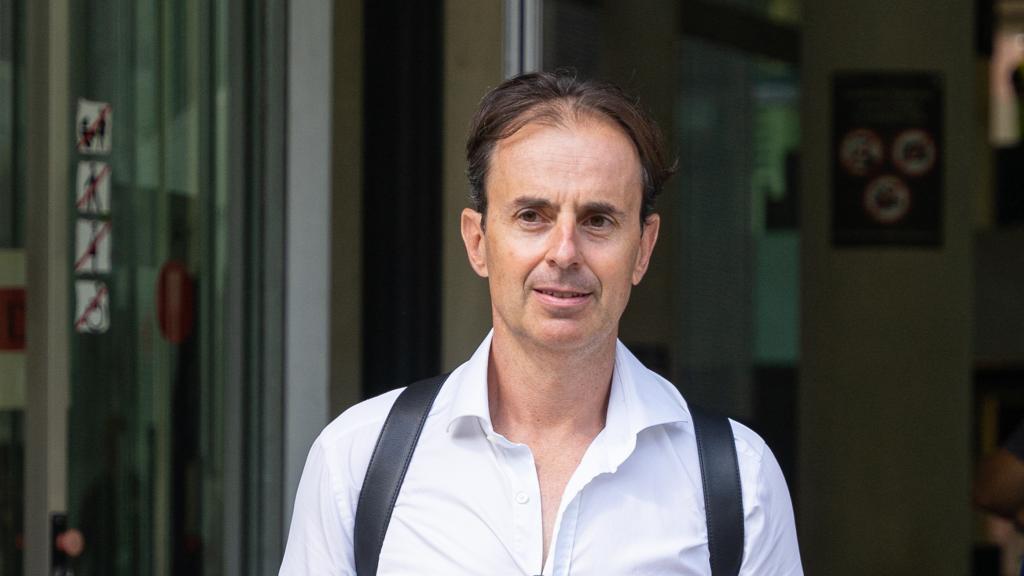 Josep Santacana y Juan Segarra a la salida de un juicio.