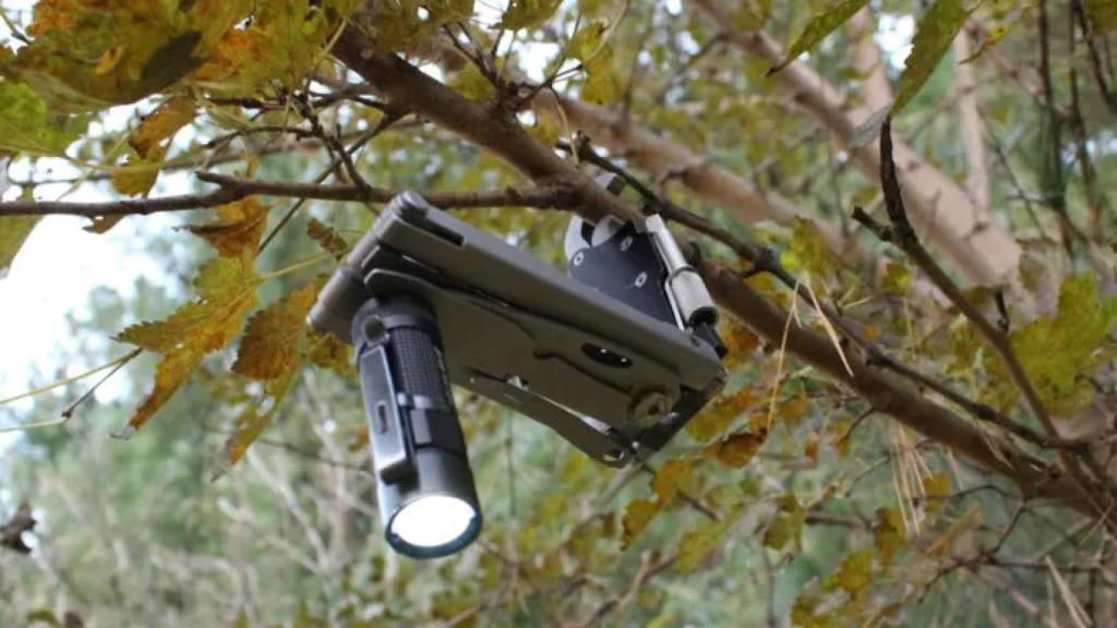 Toler Union como soporte de linterna