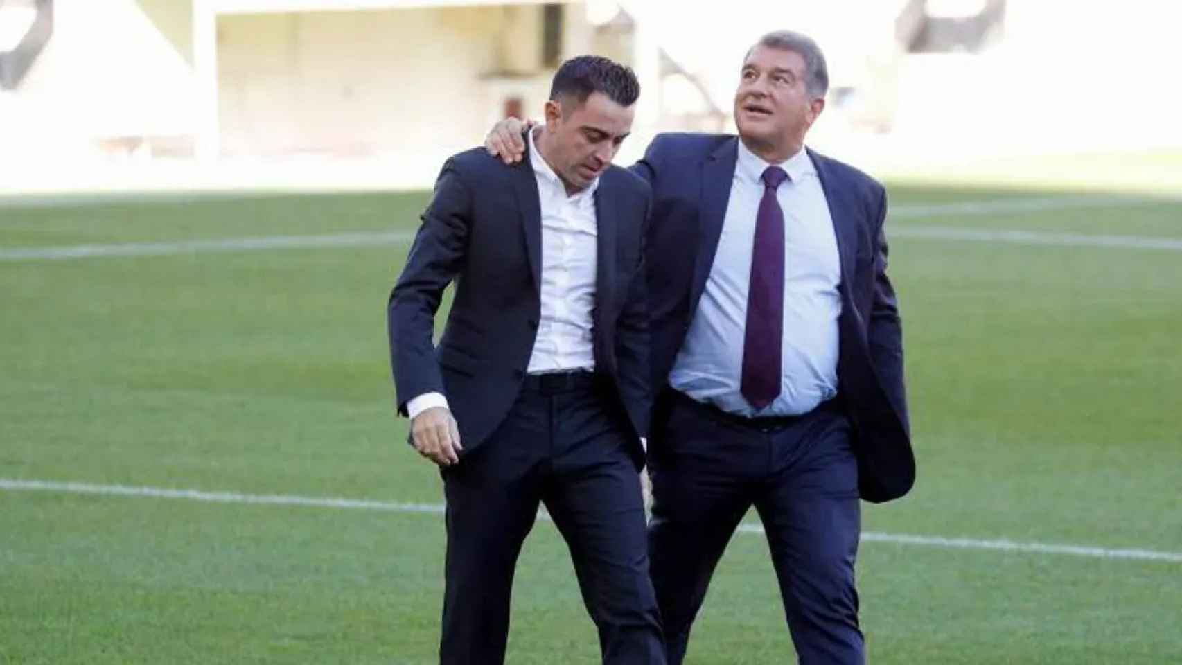 Xavi Hernández y Joan Laporta, en acto del Barça.