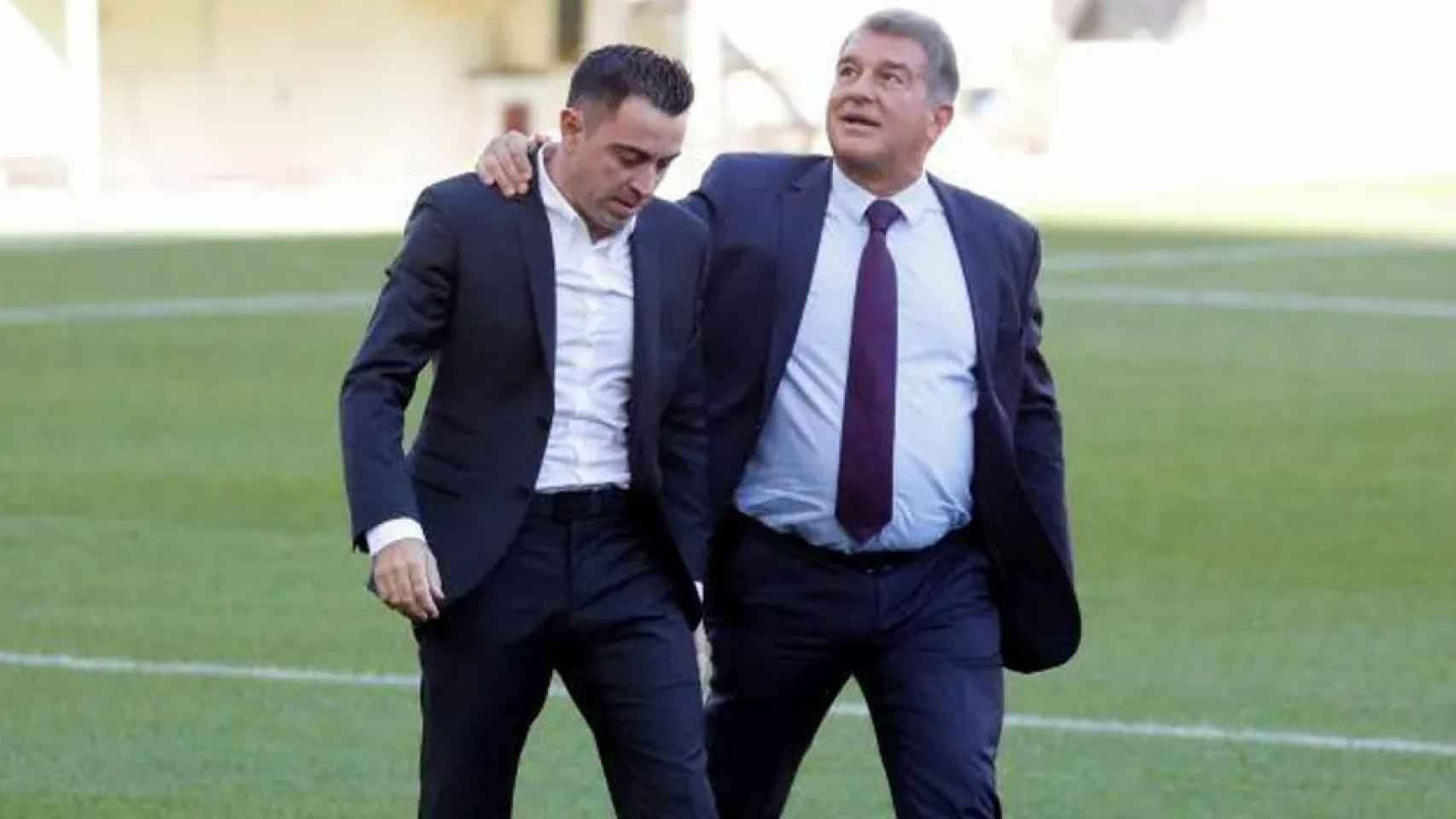 Xavi Hernández y Joan Laporta, en acto del Barça.