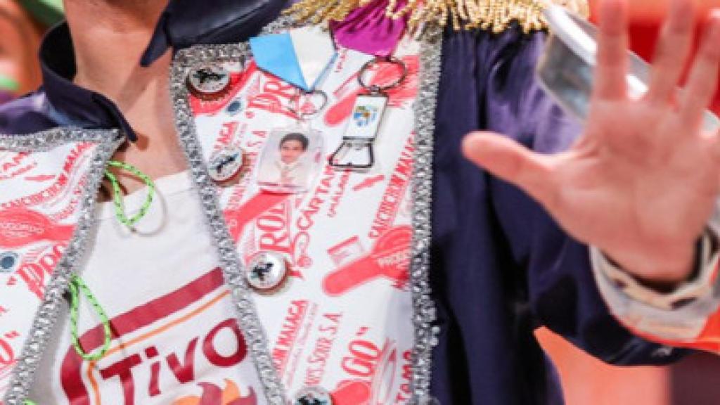 La medalla con la imagen de la comunión.