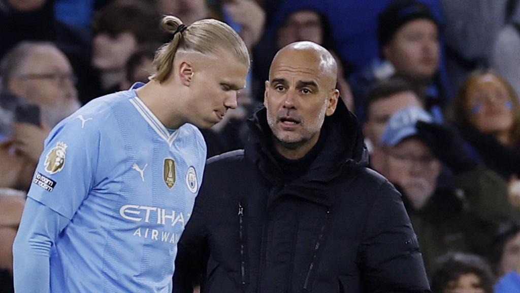 Haaland y Pep Guardiola, durante un partido del Manchester City