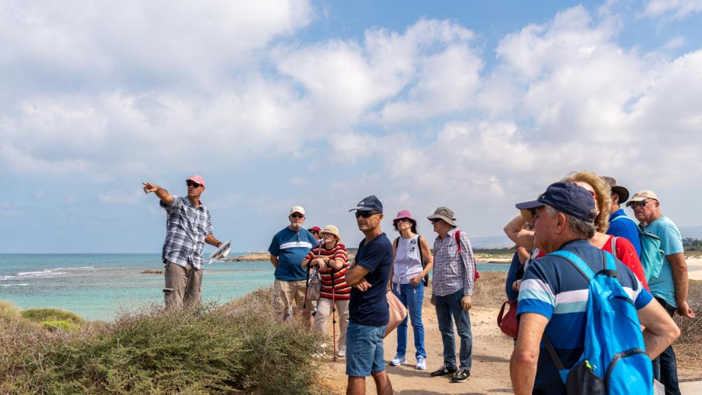 Un guía turístico con un grupo, en una imagen de archivo.