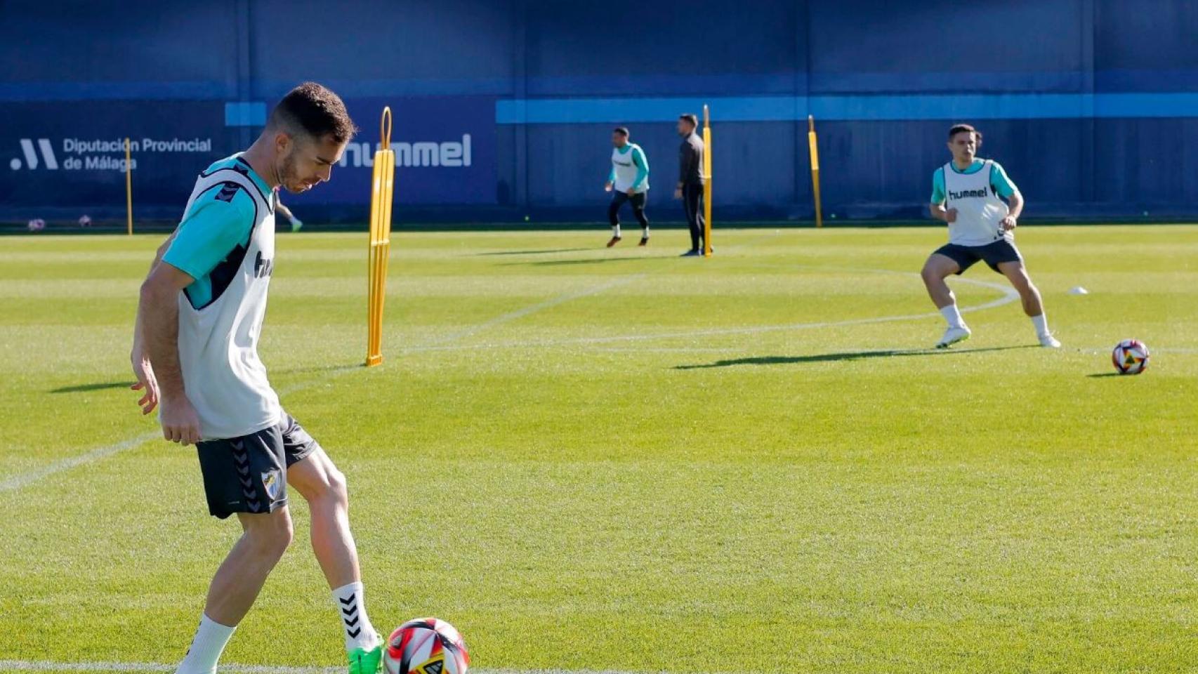 Juan Hernández y Sangalli durante un entrenamiento del Málaga CF