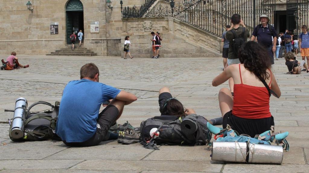 Peregrinos recién llegados a Santiago.