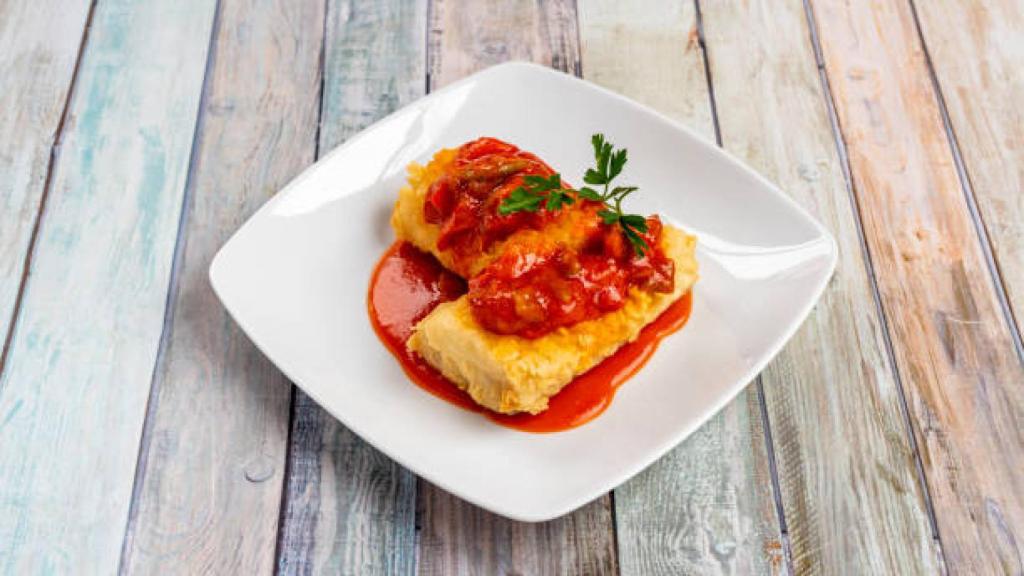 Imagen de archivo de un plato de bacalao con samfaina.