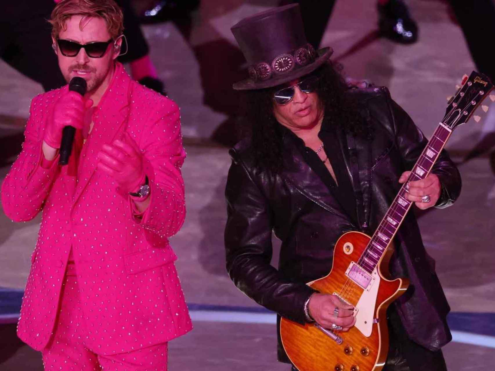 Ryan Gosling y Slash durante la gala de los Oscar.