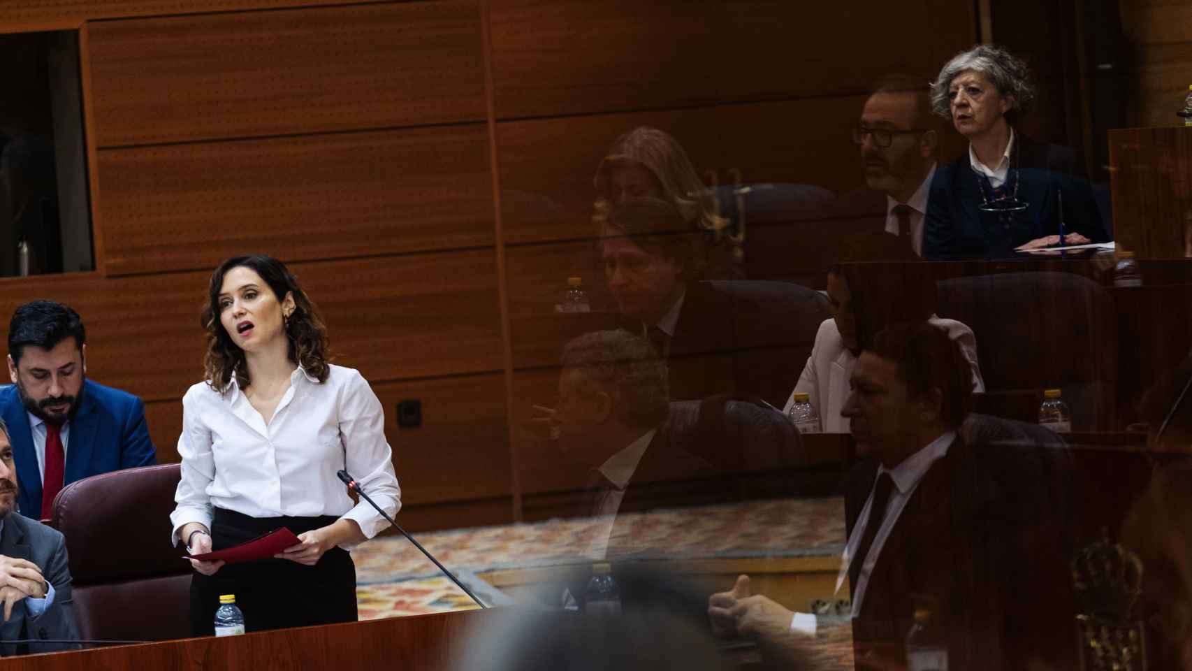 La presidenta de la Comunidad de Madrid, Isabel Díaz Ayuso, durante una sesión plenaria en la Asamblea de Madrid, a 14 de marzo de 2024