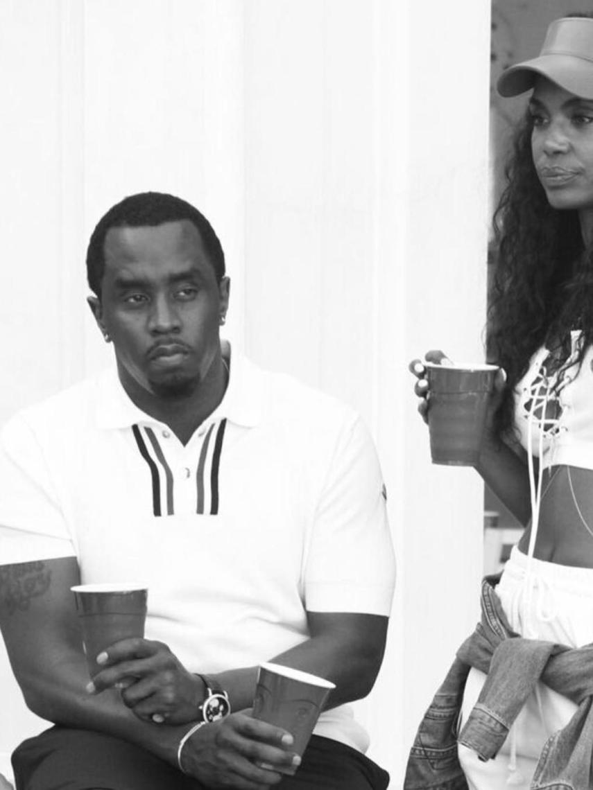 Diddy junto a la modelo y actriz Kim Porter.