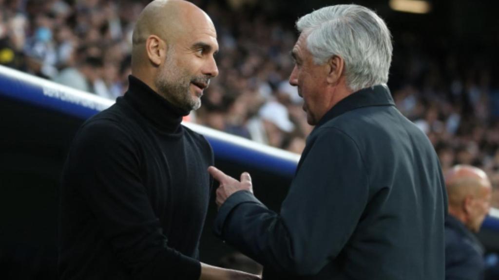 Guardiola y Carlo Ancelotti se saludan.