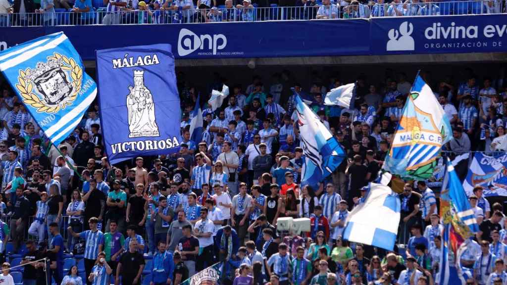 La afición del Málaga durante un partido en La Rosaleda