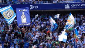 La afición del Málaga durante un partido en La Rosaleda