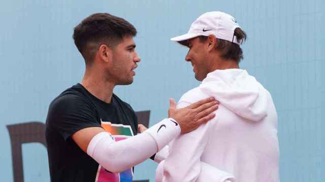 Carlos Alcaraz y Rafa Nadal, en el Mutua Madrid Open 2024