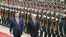 Vladimir Putin y Xi Jinping este jueves en Pekín, China.