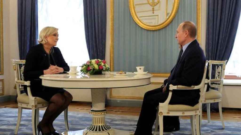Marine Le Pen and Vladimir Putin in Moscow in a 2017 image.