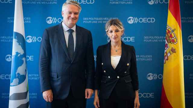 La vicepresidenta segunda y ministra de Economía y Trabajo Social, Yolanda Díaz, y el secretario general de la OCDE, Mathias Cormann.