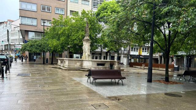 Calles mojadas en A Coruña esta mañana.