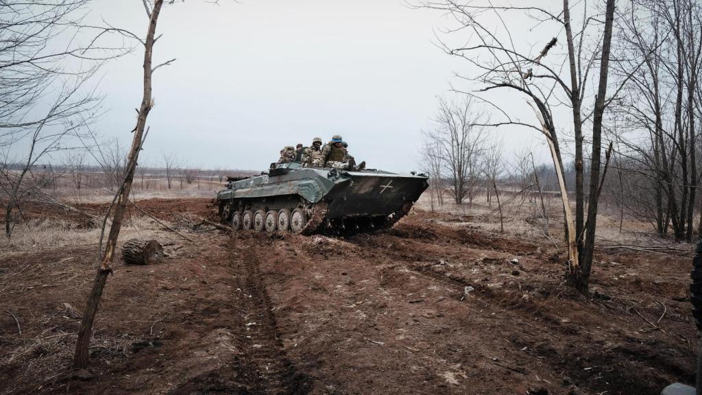 Soldiers of the 22nd Brigade, aboard an Infantry fighting vehicle, in Donetsk.