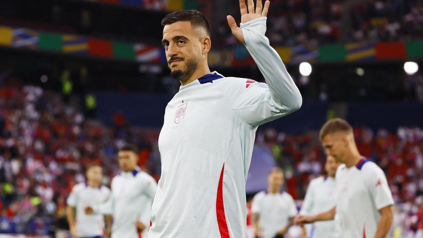 Joselu, en el calentamiento antes del partido contra Georgia.