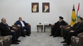 El líder de Hezbolá (dch), Hasan Nasrallá, junto con el líder de Hamás, Ismail Haniya.