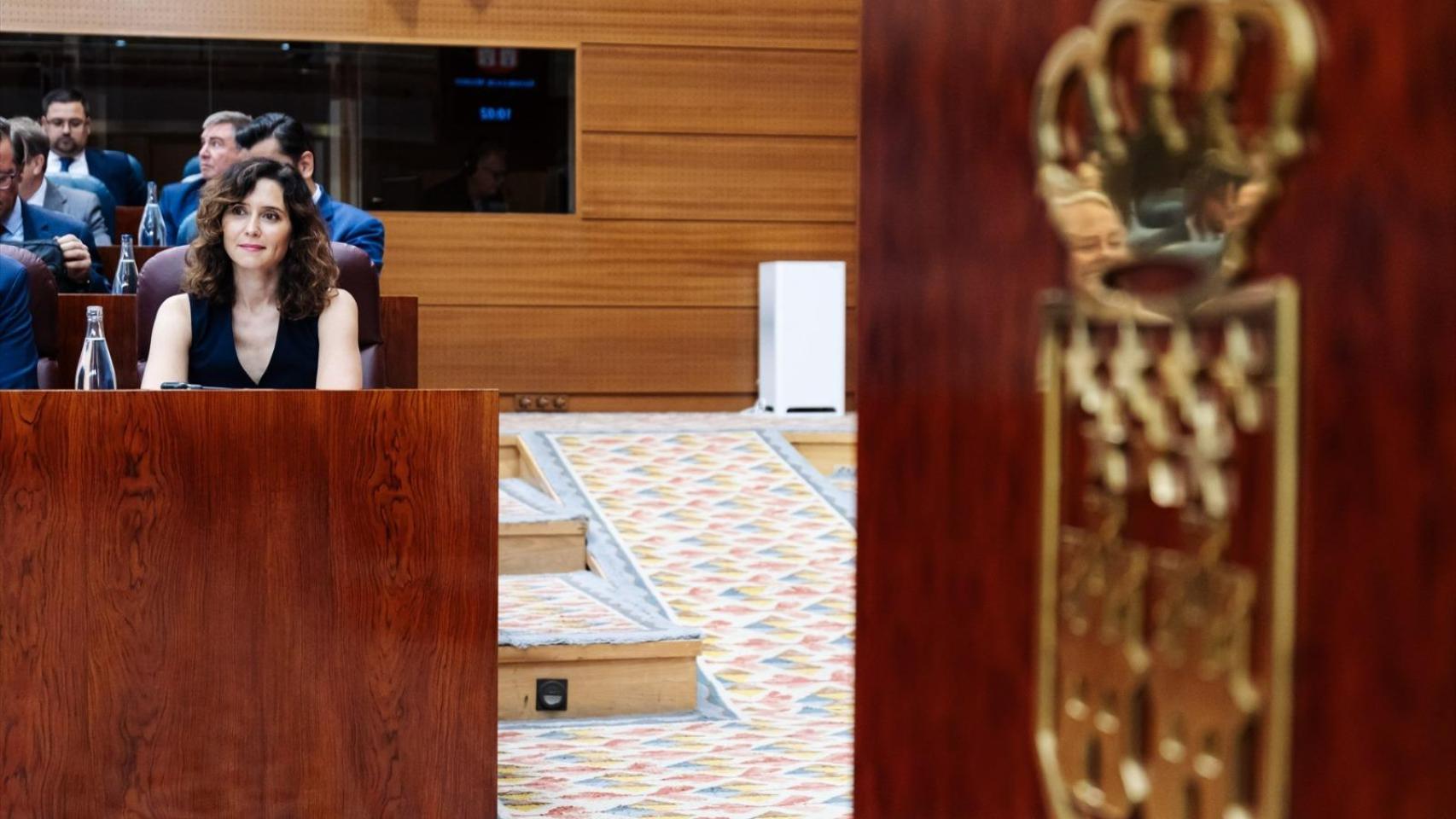 La presidenta de la Comunidad de Madrid, Isabel Díaz Ayuso, en el último pleno en la Asamblea de Madrid, el asado mes de junio.