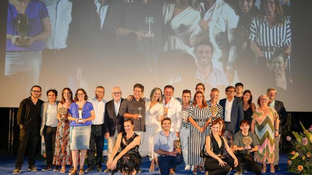 Foto de familia de los premiados.