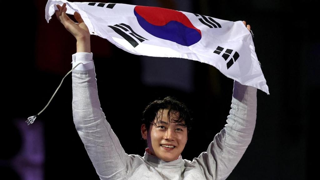 Sanguk Oh celebra un oro para Corea del Sur.